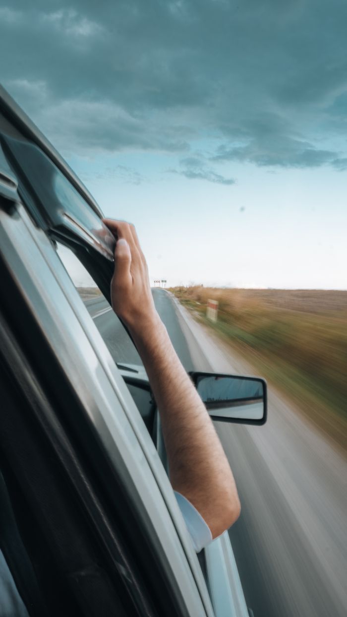 Car journey through Merzifon's scenic countryside, capturing the essence of freedom and travel.